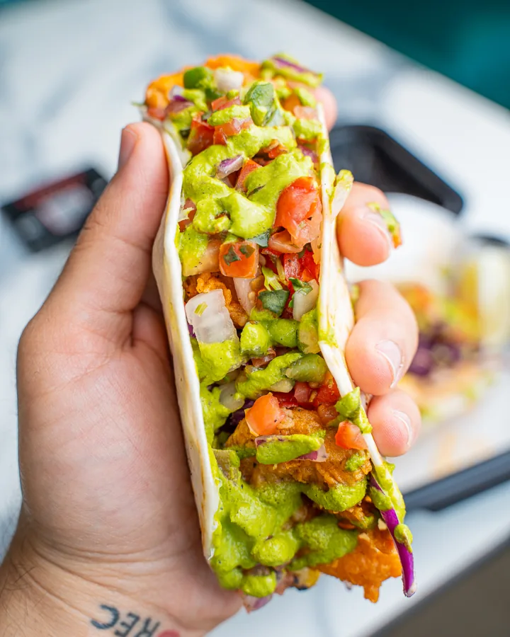Shrimp taco held up